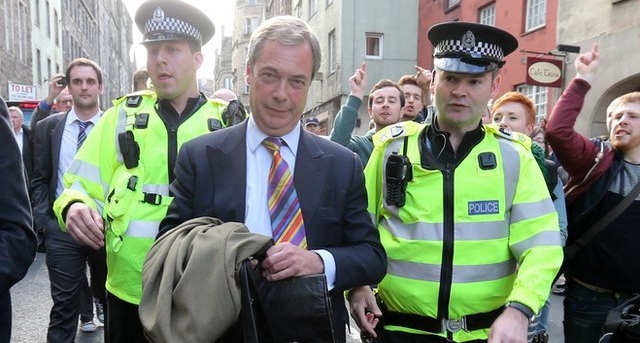 Racism row: Ukip leader Nigel Farage confronted by Scottish protestors